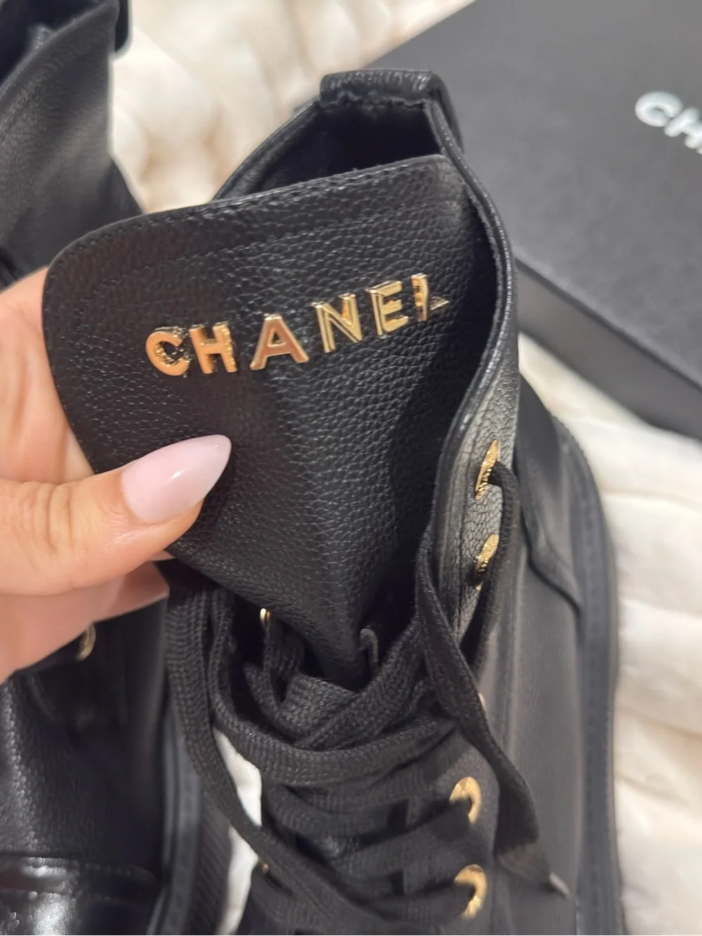 CHANEL Black Leather Lace-Up Combat Boots with Glossy Cap Toe